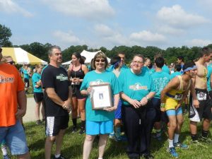 Mayor Chuck Chiarello, Deputy Mayor Teresa Kelly and Committeeman John Williams present the Run4Ricky Foundation with a plaque of appreciation at the June 13, 2015 Event.